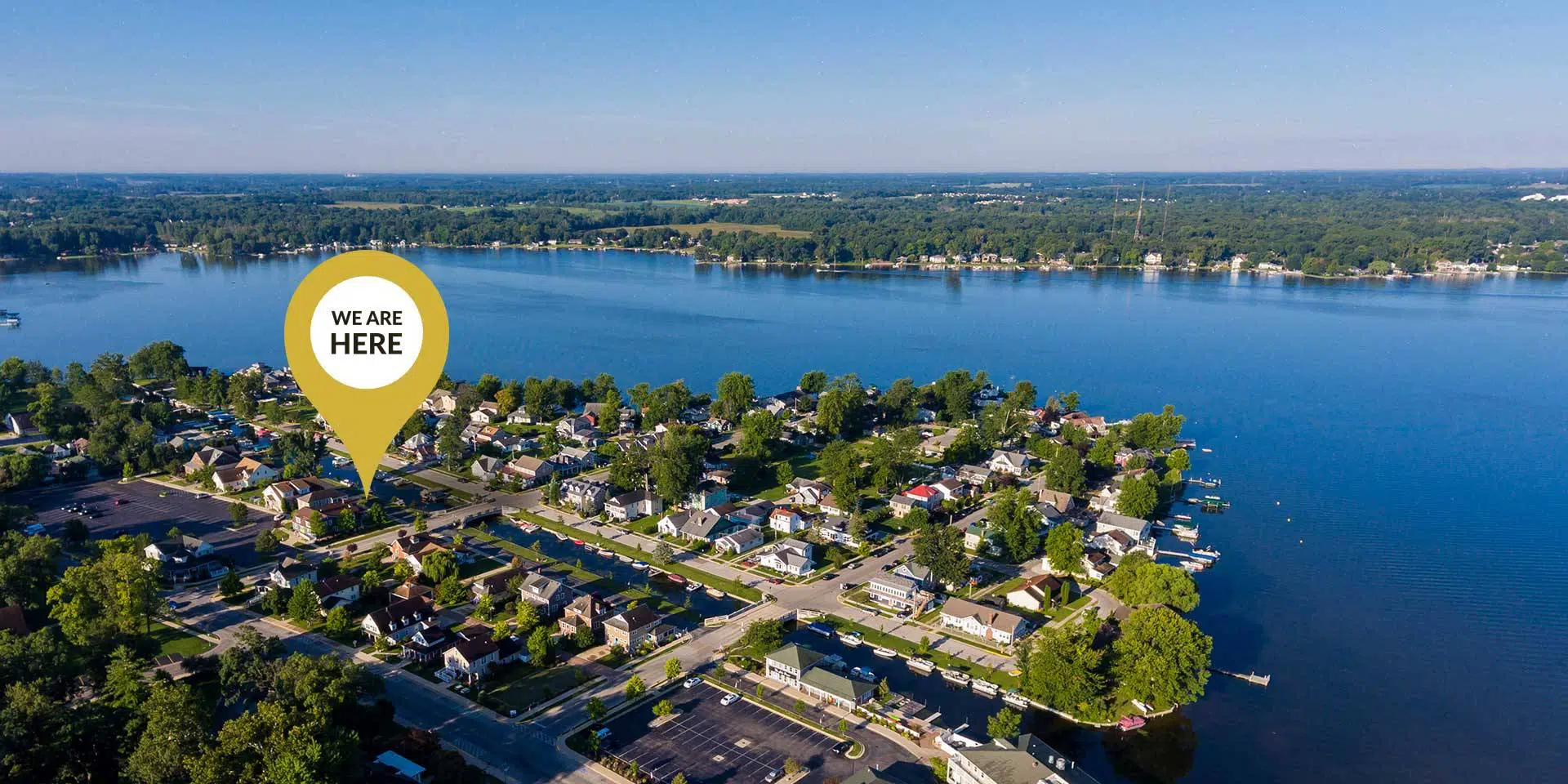 Aerial view of The Village at Winona with a map marker showing The Olive Branch location in Winona Lake, IN