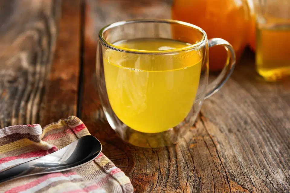 Glass mug full of a hot beverage