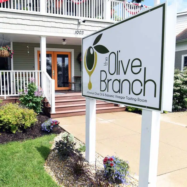 The Olive Branch sign in front of the Winona Lake location